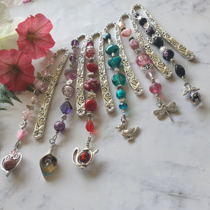 Beaded bookmarks with gorgeous glass, crystals, gemstones and a charm.