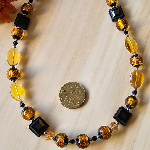 Amber and Black Luminescent Necklace