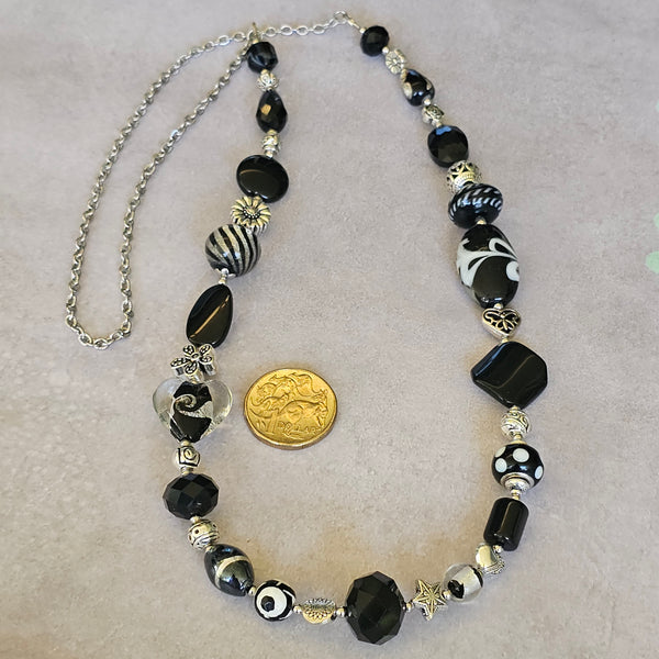 Long black beaded necklace