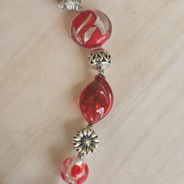 Long red beaded necklace