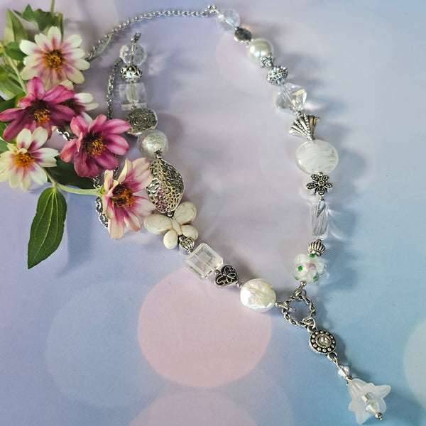 Long white beaded necklace
