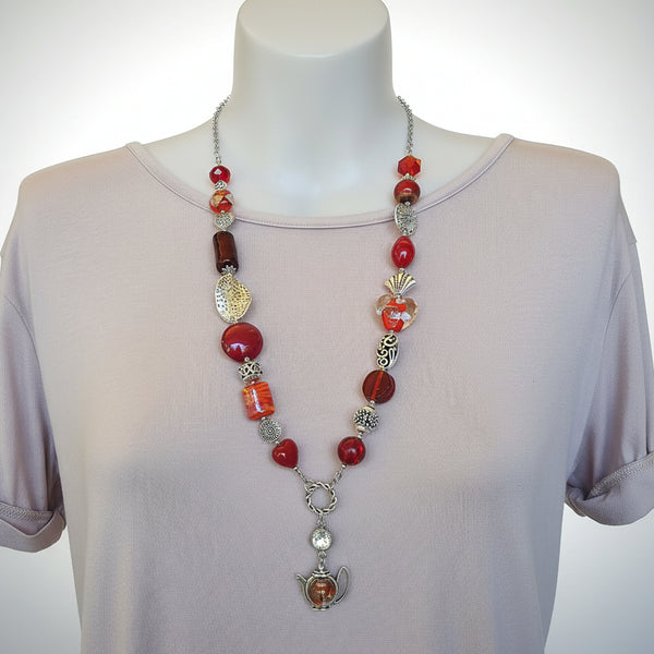 Long red beaded necklace