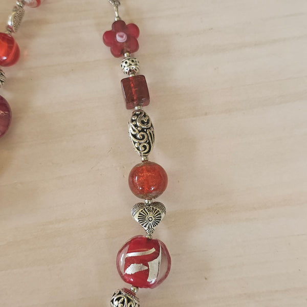 Long red beaded necklace