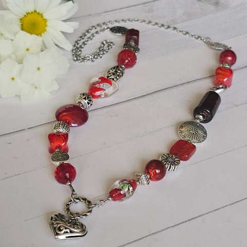 Long red beaded necklace