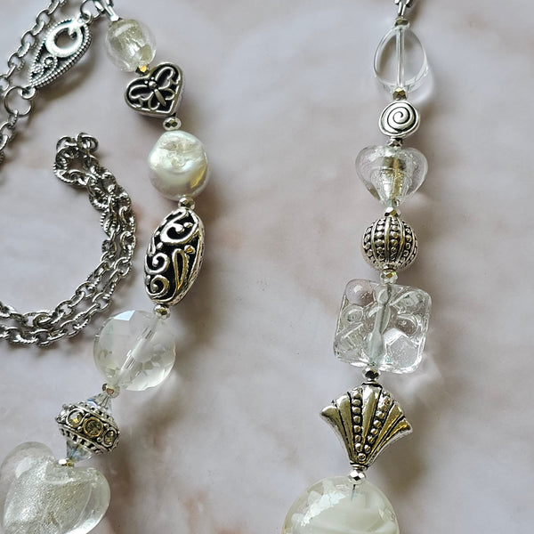 Long white beaded necklace