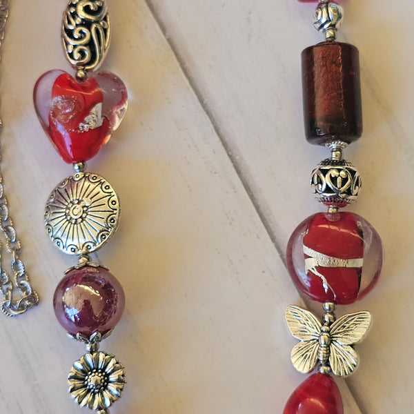 Long red beaded necklace