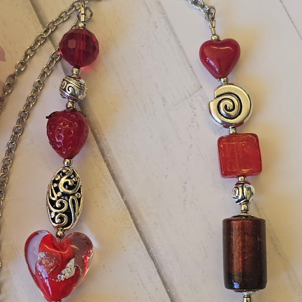 Long red beaded necklace