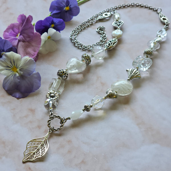 Long white beaded necklace
