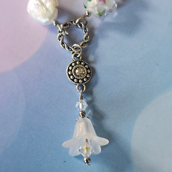 Long white beaded necklace