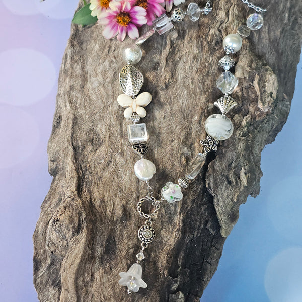 Long white beaded necklace