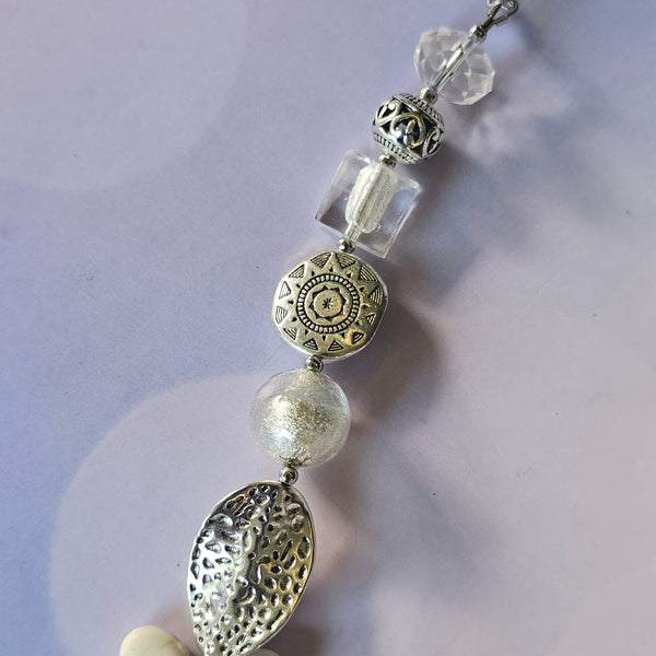 Long white beaded necklace