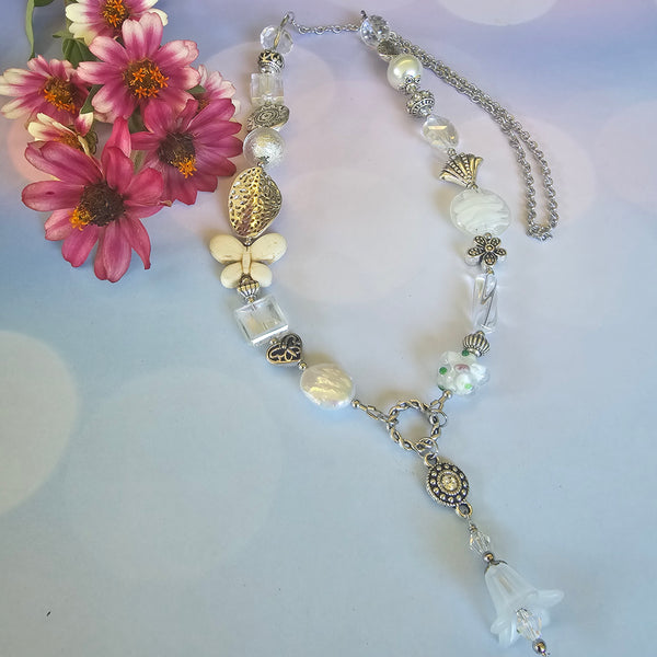 Long white beaded necklace