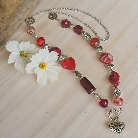 Long red beaded necklace