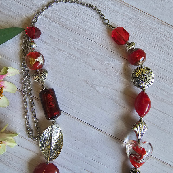 Long red beaded necklace