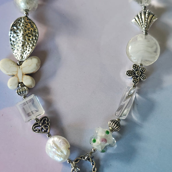 Long white beaded necklace