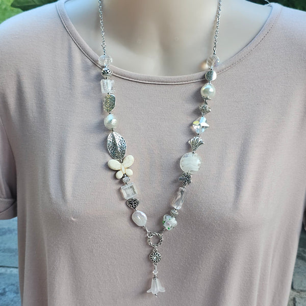Long white beaded necklace