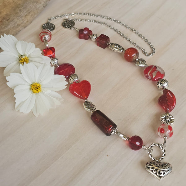 Long red beaded necklace