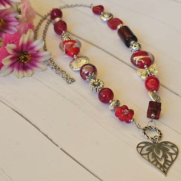 Long red beaded necklace